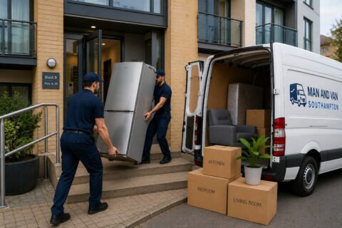 Professional flat and apartment movers in Southampton carrying a fridge into a modern apartment building